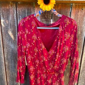 Floral & Flirty! Fantastic ruffled-edge romper!